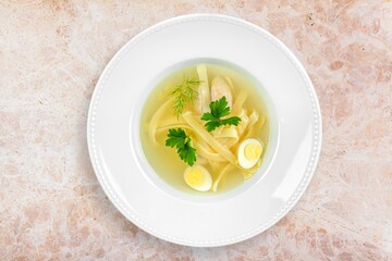 Tasty fresh soup with vegetables on the desk