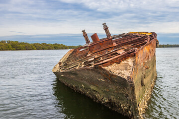 Exposure of Shipwreck location in Adelaide, were you can find several vessels been eaten by rust, Garden Island Ships' Graveyard, Adelaide, Australia.