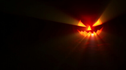 Halloween pumpkin with light rays