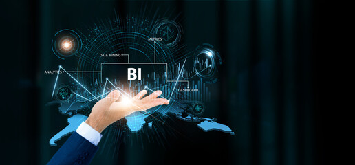 Businessman hold BI words and growth technology and data connection. Data analytics, performance dashboard, predictive insight, strategic decision-making.