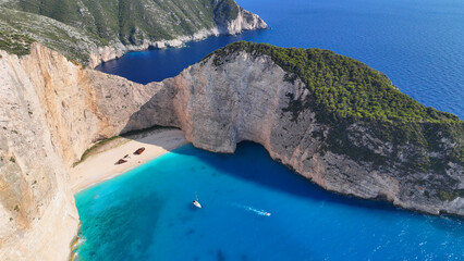 Aerial drone photo of one of the most photographed beaches in the world called navagio or shipwreck...