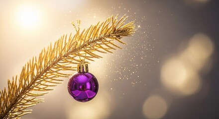 A close-up shot of a golden branch adorned with a single purple ornament, capturing the essence of the season.