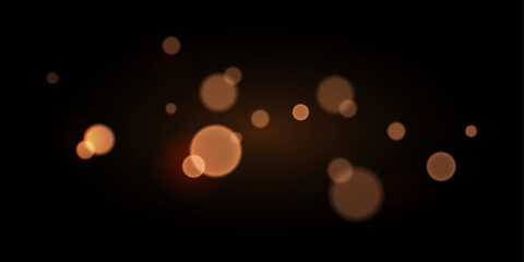 Abstract vector background with golden bokeh light effect on black © umut hasanoglu