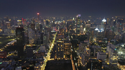 Illuminated skyscrapers and Lumpini park in Bangkok