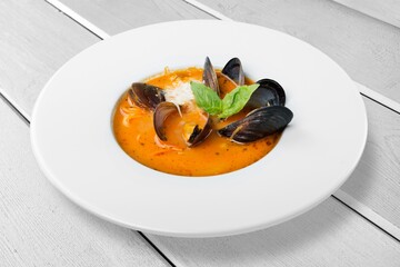 Tasty fresh soup with vegetables on the desk