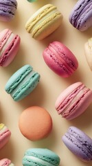 Fototapeta premium Colorful Macarons on Beige Background for Sweet Treats