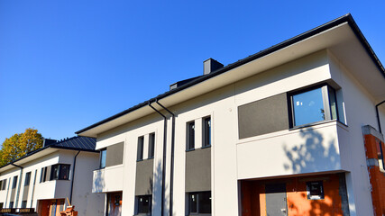 Terraced houses under construction. Housing estate development under construction.  