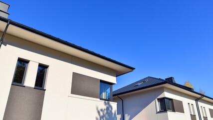 Newly built terraced houses in a residential area. Modern terraced houses on the outskirts of the city.