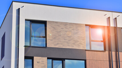 Newly built terraced houses in a residential area. Modern terraced houses on the outskirts of the...