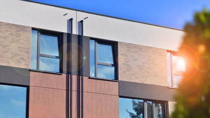 Newly built terraced houses in a residential area. Modern terraced houses on the outskirts of the...