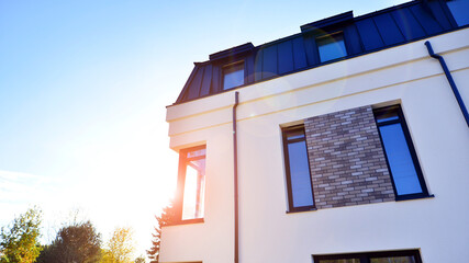 Newly built terraced houses in a residential area. Modern terraced houses on the outskirts of the...
