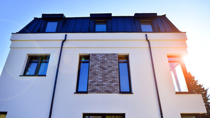 Newly built terraced houses in a residential area. Modern terraced houses on the outskirts of the city.