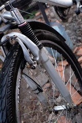 Front wheel of bicycle with structural details close-up