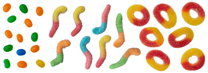 Assorted colorful jelly beans lollies and candies scattered against a transparent background