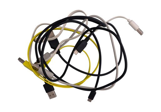 Old used cables tangled, isolated against a transparent background