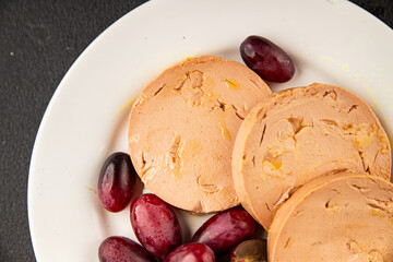 Foie gras pate goose liver delicacy tasty snack fresh delicious gourmet food background on the table rustic top view copy space