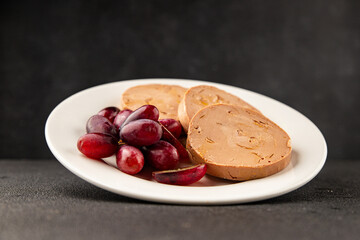 Foie gras pate goose liver delicacy tasty snack fresh delicious gourmet food background on the table rustic top view copy space