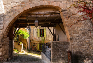 Passageway under a house in the medieval village of Penne, in the Tarn department, Occitanie region, France.