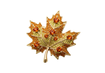 Sparkling gold maple leaf brooch with orange accents
