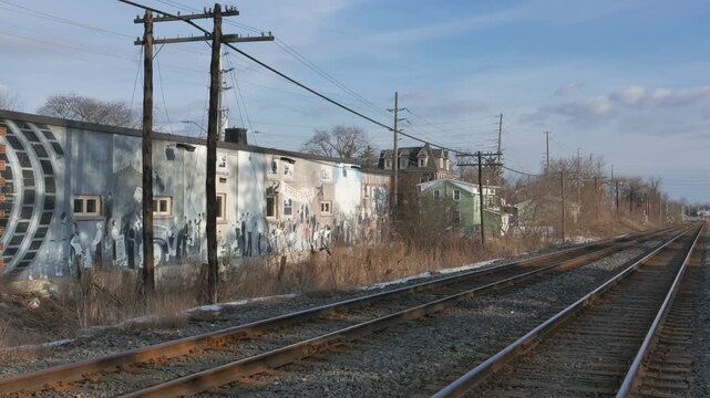 Train tracks passing through the Streetsville village area of Mississauga, Ontario, Canada during a cold winter afternoon.