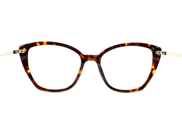 Rear view looking through a pair of pretty butterfly shape wonen's glasses with a brown tortoiseshell frame isolated on a plain white background. Copy space. No people.