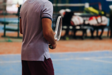 Tennis tournament championship on outdoor clay court with net, professional athletes play in motion with rackets serve tennis ball during tennis match game, tennis training in a sunny day on a stadium
