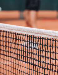 Tennis tournament championship on outdoor clay court with net, professional athletes play in motion with rackets serve tennis ball during tennis match game, tennis training in a sunny day on a stadium
