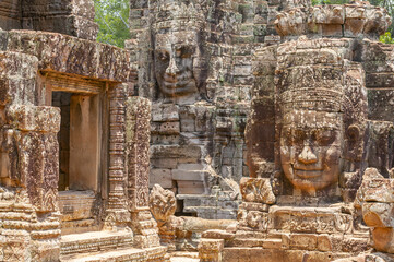 Buddha face in traditional khmer architecture, Bayon temple, Angkor, Cambodia.