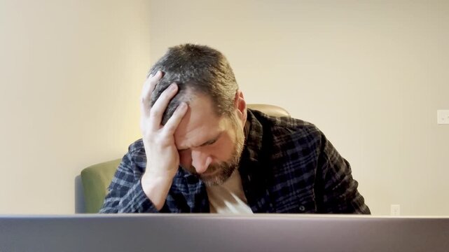 Remote Worker Struggling to Keep Sanity While Being Lonely Trying to Problem Solve in Dark Winter Days