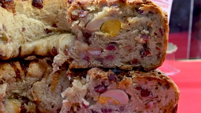 Naples, Italy, December 28, 2024. Extreme close-up of one of the local culinary specialties: a bread locally called castiello made with hard-boiled eggs, bacon, lard, and cheese.