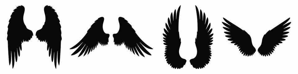Collection of four distinct black silhouette angel wings designs isolated on a white background for creative use
