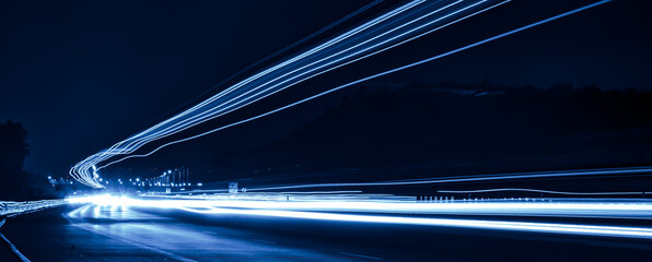 blue car lights at night. long exposure