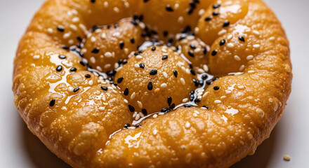 Fried New Year&rsquo;s Cake (Niangao) drizzled with syrup and sesame seeds  