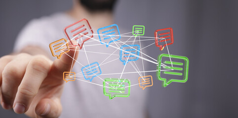 A hand interacts with a network of connected digital message icons, representing communication, connection and social media interaction.