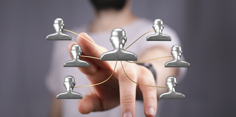 Conceptual image representing a network or connection using human figures linked together with...