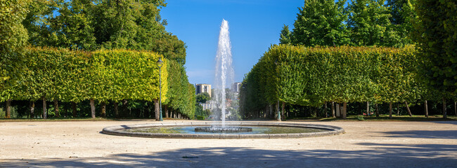 Symmetrical Fountain in a Tree-Lined Park Blossac in Poitiers