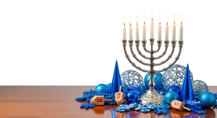 Glowing menorah with festive blue decorations on wooden table for Hanukkah  