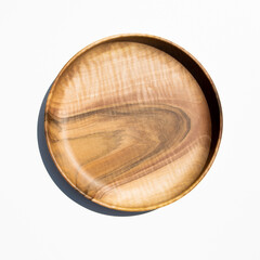 Empty wooden plate on white background