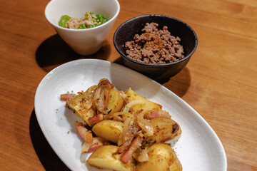 Homemade dinner with potatoes and bacon