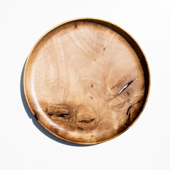 Empty wooden plate on white background