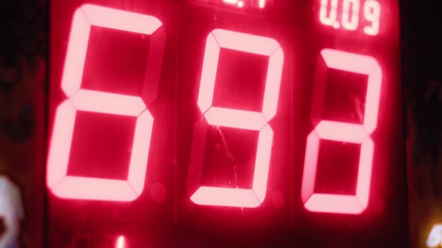 Display showing a red digital score counter of a punching game at a fun party