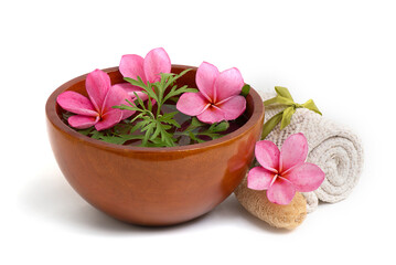 Aromatherapy with Annual Mugwort branch green leaves and pink plumeria flowers in wooden tub...