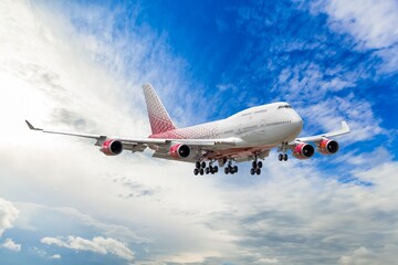 Obraz premium Airplane flying in blue sky, for travel concept