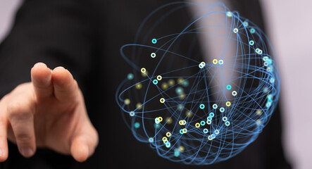 Visual representation of global network and digital connectivity, with a finger touching a sphere of interconnected nodes. The future and global