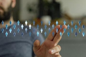 Abstract concept of human figures interacting with a hand, representing communication, technology, and connection. Perfect for tech or business