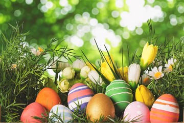 A basket of bright colorful Easter eggs outdoor