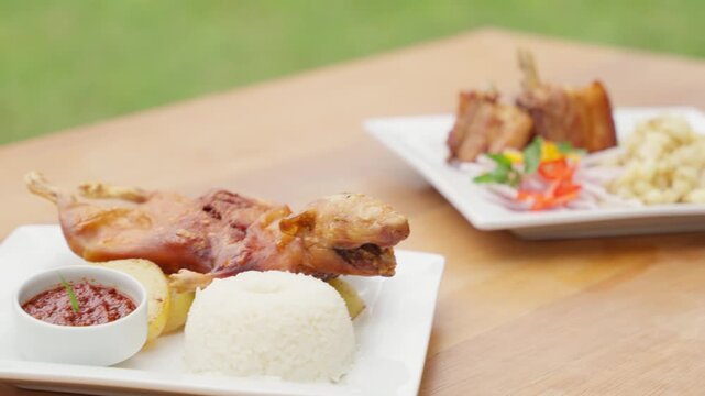 Traditional peruvian food dishes served on an outdoor restaurant table