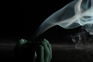 Candle after burning with smoke trail