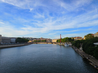 Lyon, France, May 29, 2025, View of the Rhone River and its embankment, waterfront Blue Sky