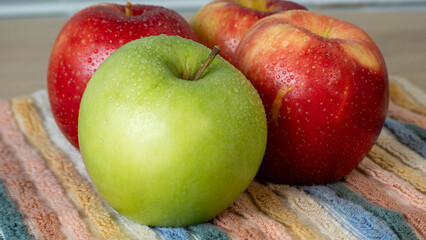 apples on a wooden table